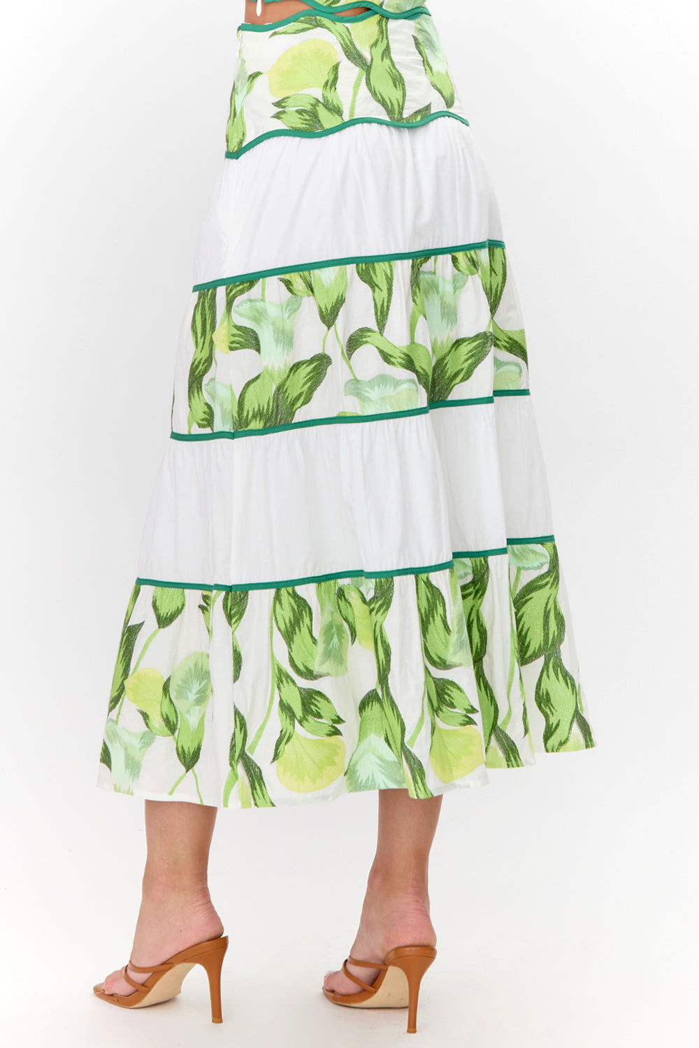 Back view of  tiered, floral midi skirt.